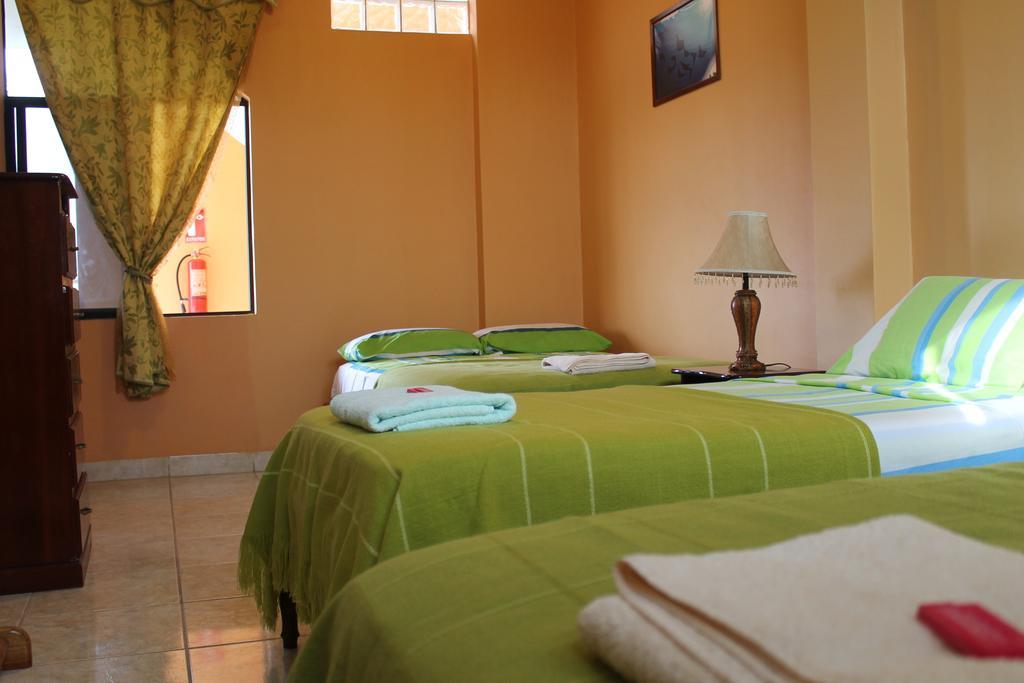 Hotel Dolphin House Puerto Baquerizo Moreno Camera foto